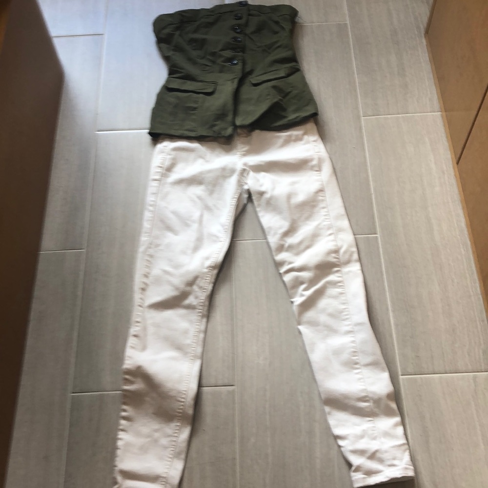 White high waist moto jeans with strapless bottom fitted top.